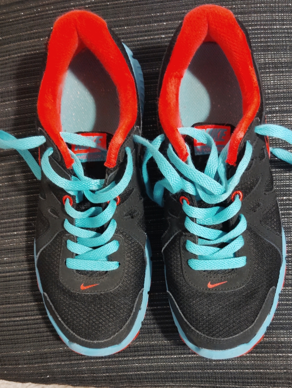Nike Black Sneakers with Turquoise Laces and Red Interior